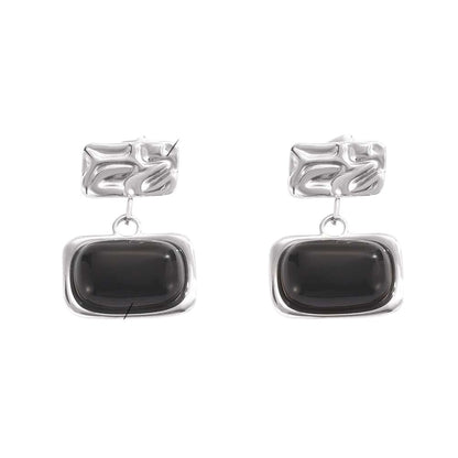 Boucles d'oreilles sculptées noires